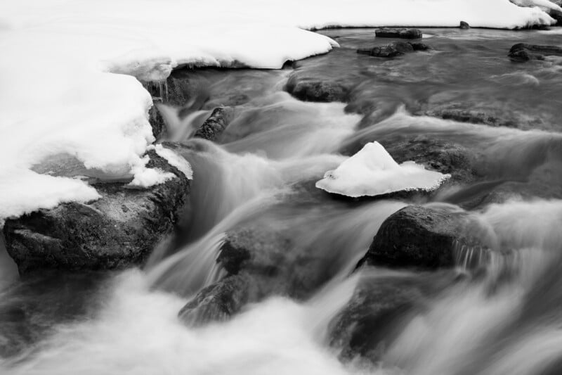  Sony FE 24-50mm f/2.8 G black and white river