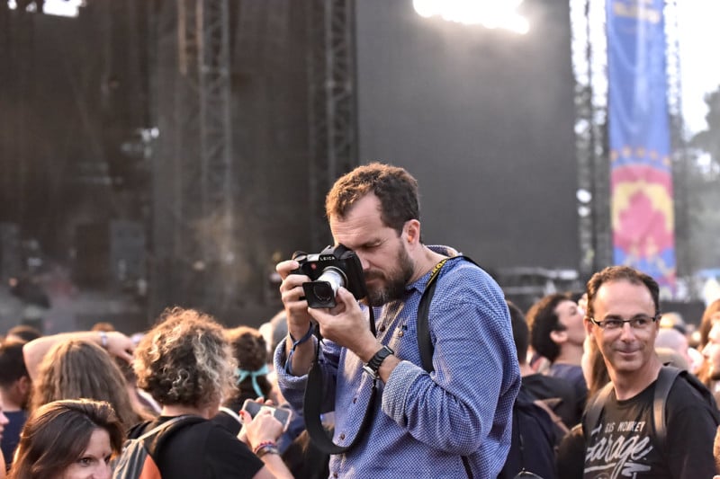 man taking photos