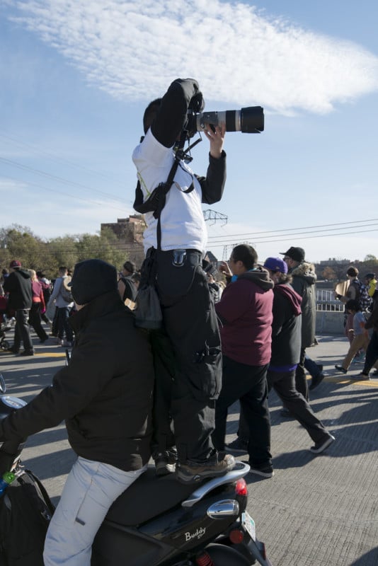 man with telephoto